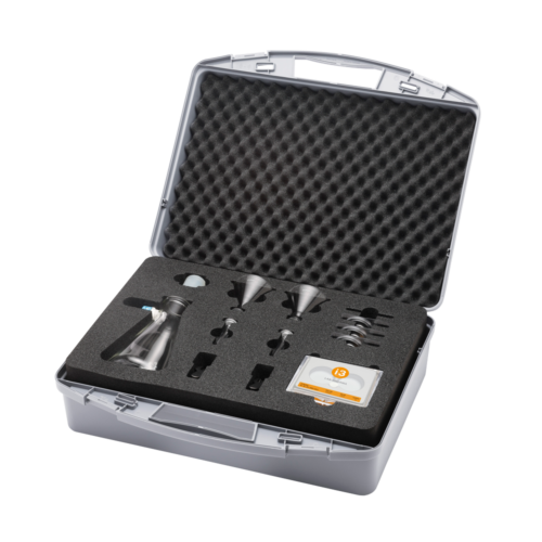 Angled view of the opened case of the vacuum filtration unit with all visible components