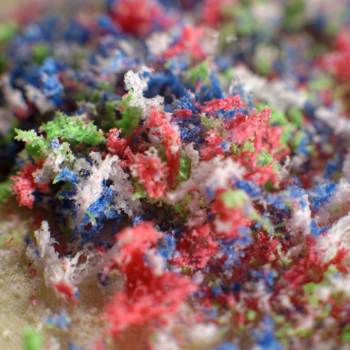 Close-up of colorful microplastic fibers